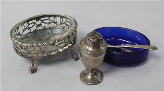 A Georgian silver salt(a.f.), two glass liners, a pepper and two condiment spoons.